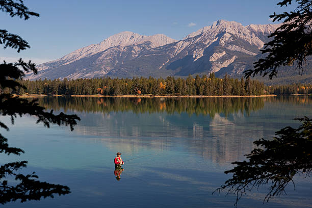 istock Fly Fishing In Rocky Mountains, Alberta, Canada 153693474
