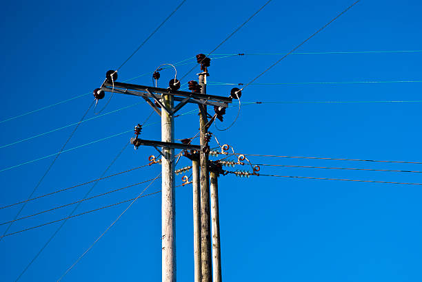 istock Electricity transmission poles with power lines 153694093