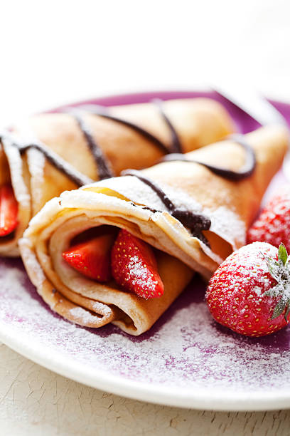 istock Crepes with chocolate sauce and strawberries 153694381