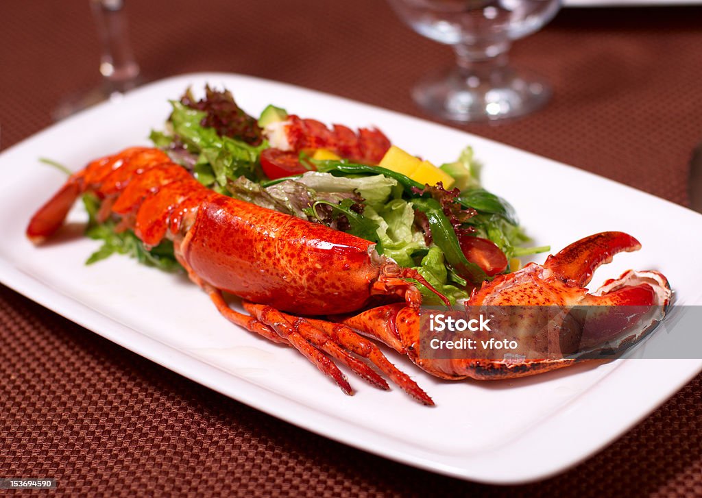 lobster with salad and tomato lobster with salad and tomato cherry Crustacean Stock Photo