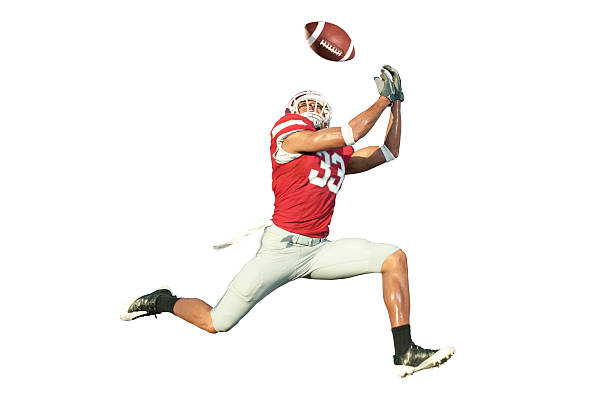 football-spieler einen ball fangen - receiver stock-fotos und bilder