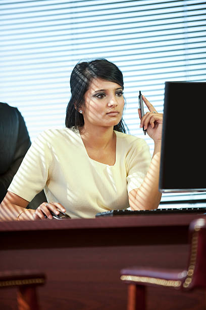 istock Ethnic Business Woman Looking At Computer Screen 153696639