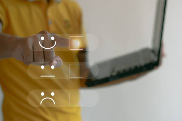istock Man is rating satisfaction, customer satisfaction poll concept. Customers can evaluate the quality of service. 1536969699