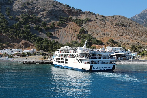 People ride Anendyk Ferries passenger ferry connecting Agia Roumeli in South Crete with Paleochora and Loutro.
