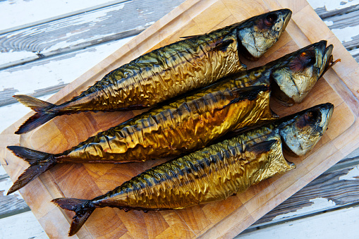 Fresh Raw Tilapia fish - food preparation.