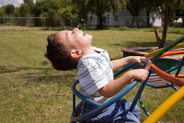 Toddler boy happy on the playground