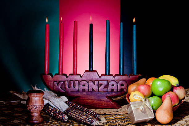 kwanzaa-afroamericano vacanza - gift apple ribbon fruit foto e immagini stock