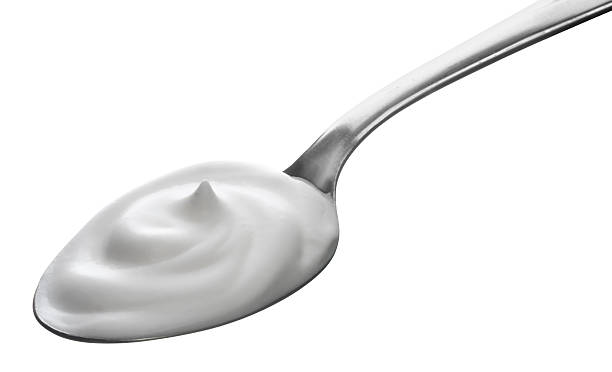 istock spoon of yogurt 153698579