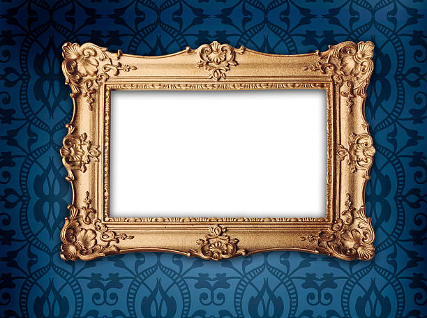 gold frame on victorian or regency style wallpaper stock photo