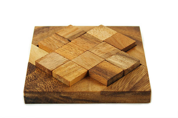 istock wooden square figures assemble in puzzle isolated 153699035