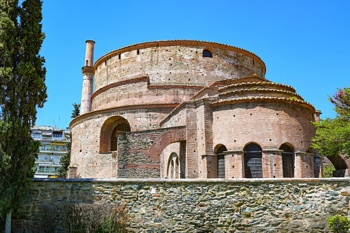 Rotunda mausoleum of Galerius, landmark and historic monument from 4th century, now Orthodox Church of Agios Georgios in the city center of Thessaloniki, Greece, blue sky with copy space
