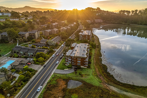 Aerial View above Tiburon with San Francisco skyline in the distance. Luxury homes below.