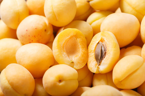 istock fresh apricots as background, top view 1536994709