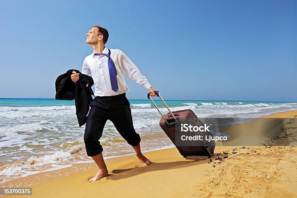 Full Length Portrait Of A Lost Man Carrying Suitcase Stock Photo - Download Image Now