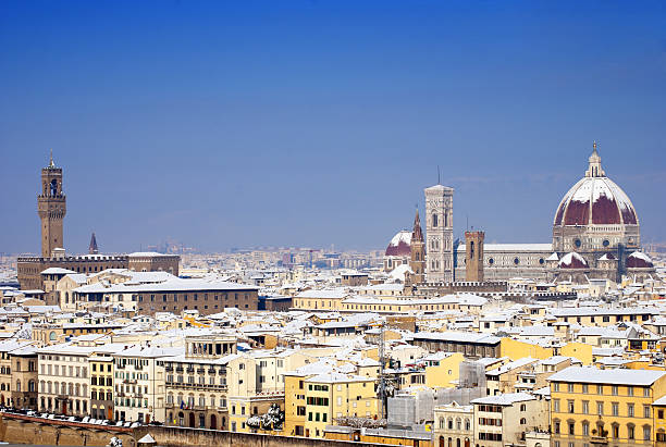 istock Duomo and Palazzo Vecchio of Florence with snow 153700927