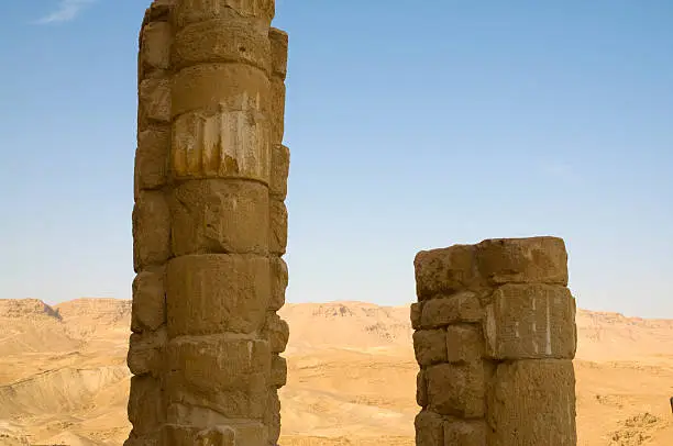 A view of Ancient pillars on Masada towards Judean Mountains