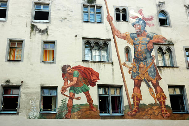 ダヴィドと goliath のハウスの壁、レーゲンスブルク、ユネスコの遺産 - david ストックフォトと画像