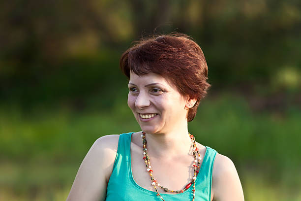istock middle age caucasian woman in nature 153701508
