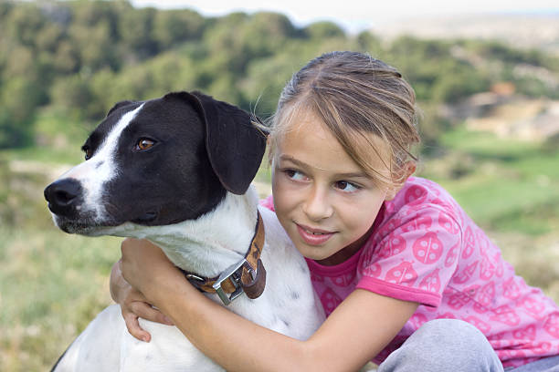 Girl with dog stock photo