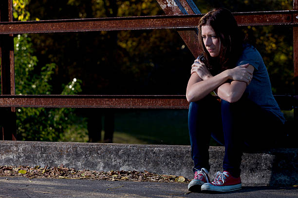 istock Lonely Girl on a Bridge 153701982