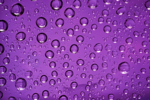 water drops in violet light
