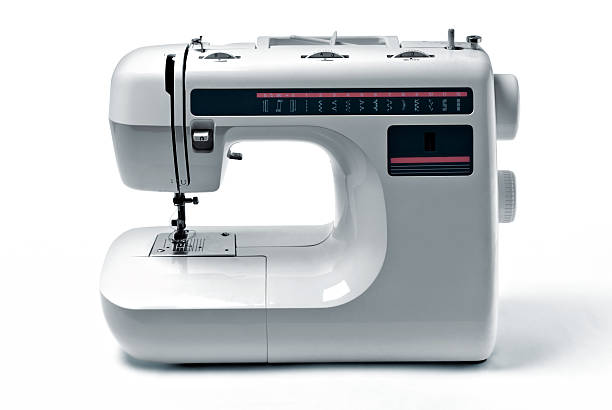 Sewing machine. Domestic sewing machine on white background. sewing machine stock pictures, royalty-free photos & images