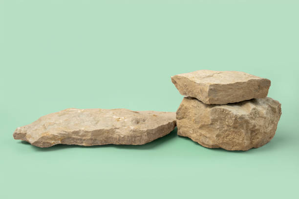 istock Stone podium for show cosmetics product presentation. Abstract minimal backdrop. Three rock form. Light Green Studio Background. Scene. Showcase display case. 3D Front View. Trendy neutral color. Space 1537052743