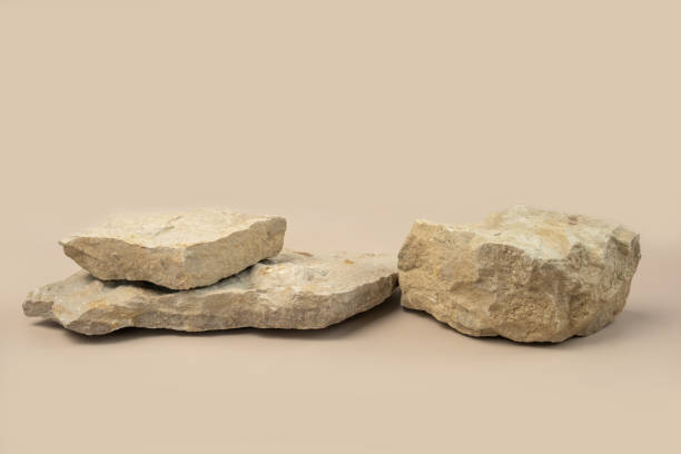 istock Stone podium for show cosmetics product presentation. Abstract minimal backdrop. Three rock form. Beige Nude Studio Background. Scene. Showcase display case. 3D Front View. Trendy neutral color. Space 1537052744