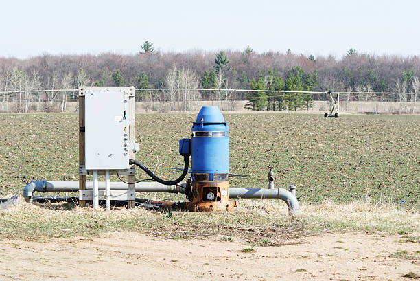 blue irrigation well - putten stockfoto's en -beelden