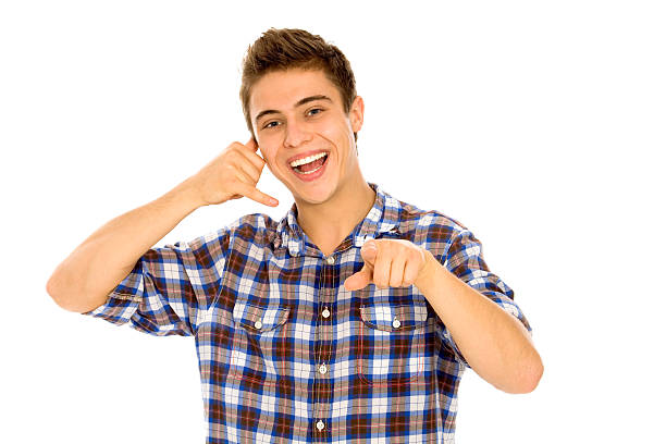 istock Young man showing call me gesture 153705988