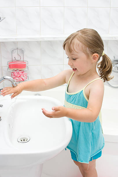 istock little girl in bathroom 153706509