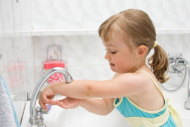 istock little girl in bathroom 153706512