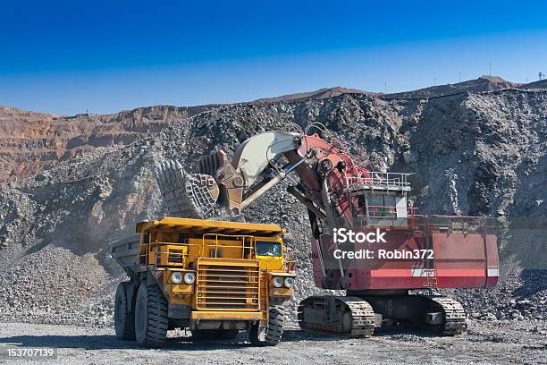 Loading The Gold Ore Into Heavy Dump Truck Stock Photo - Download Image Now - Loading, Metal Ore, Gold Mine