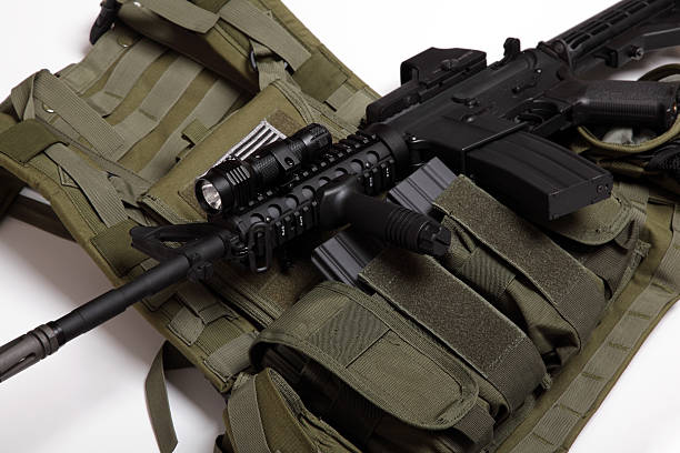 istock Military concept. Tactical vest and assault rifle. 153707148