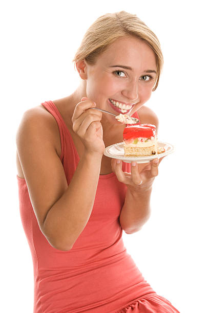 istock Woman eating cake 153707205