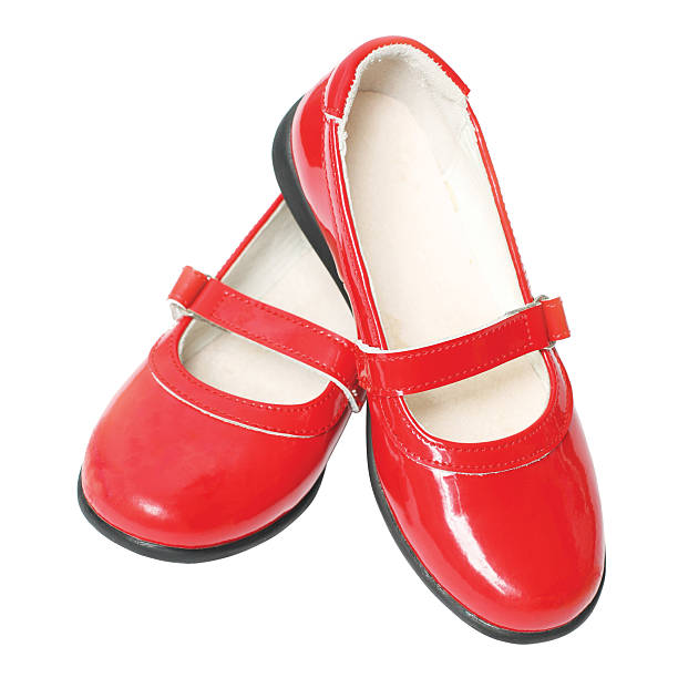 istock Red children's varnished shoes isolated on white background 153707790
