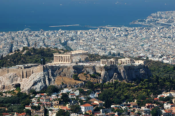 View of Acropolis from Lykavittos hill - Athens highest point View of Acropolis from Lykavittos hill - highest point of Athens piraeus photos stock pictures, royalty-free photos & images