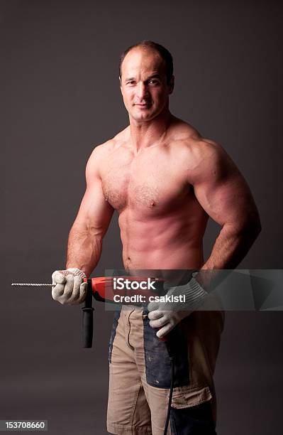 Muscular Construction Worker Stock Photo - Download Image Now - Mechanic, Muscular Build, Repairman