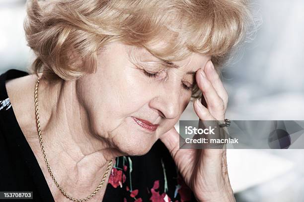 Senior Lady With Headache Stock Photo - Download Image Now - Adult, Adults Only, Blond Hair