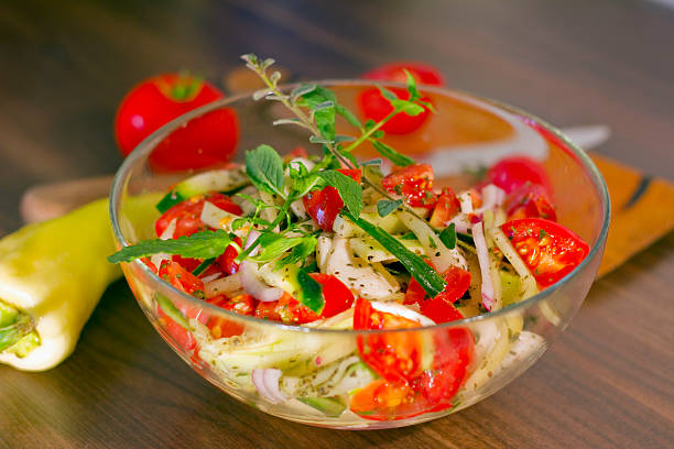 Salad in glass dish stock photo