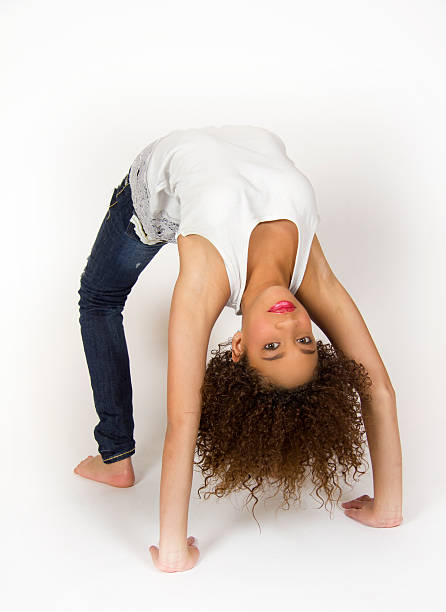 istock Young gymnast in a back walkover 153710873
