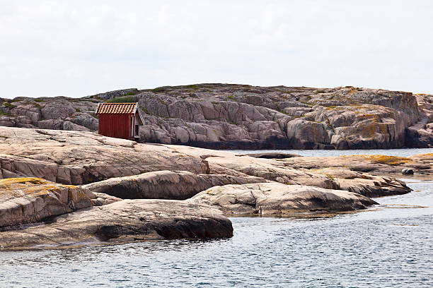 istock Wood shed on the rocks 153711188