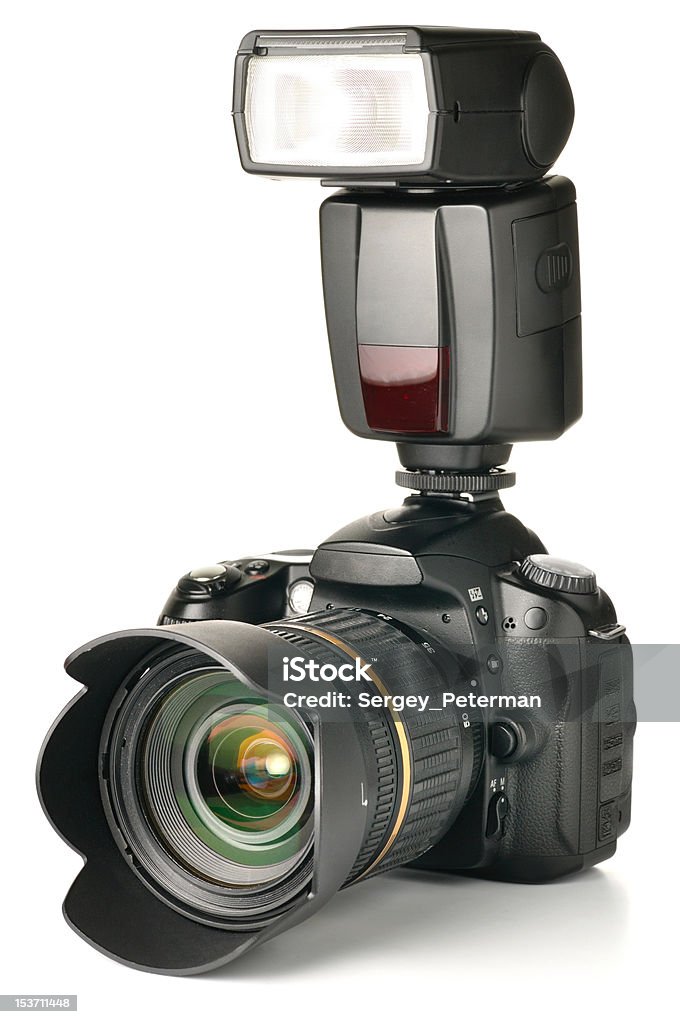 photo camera with an external flash attached Camera - Photographic Equipment Stock Photo