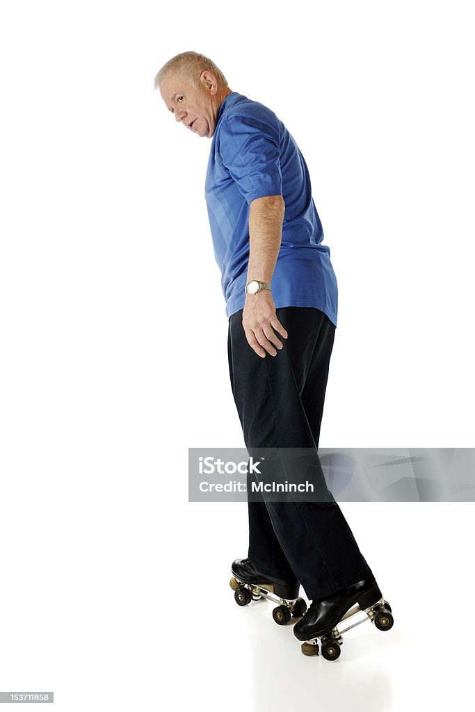 Senior patinaje atrás - Foto de stock de 60-69 años libre de derechos