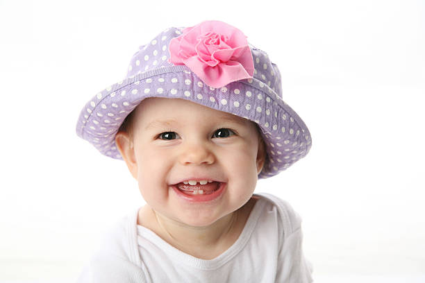 Smiling baby with hat stock photo