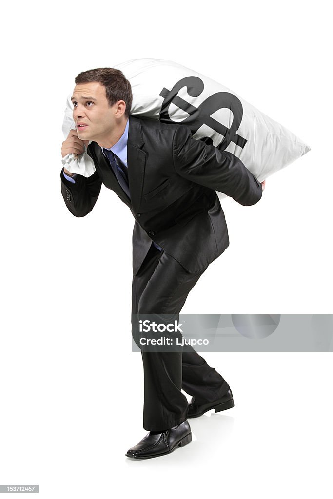 Full length portrait of a man carrying bag Full length portrait of a businessman carrying a money bag with US dollar sign isolated on white background Abundance Stock Photo