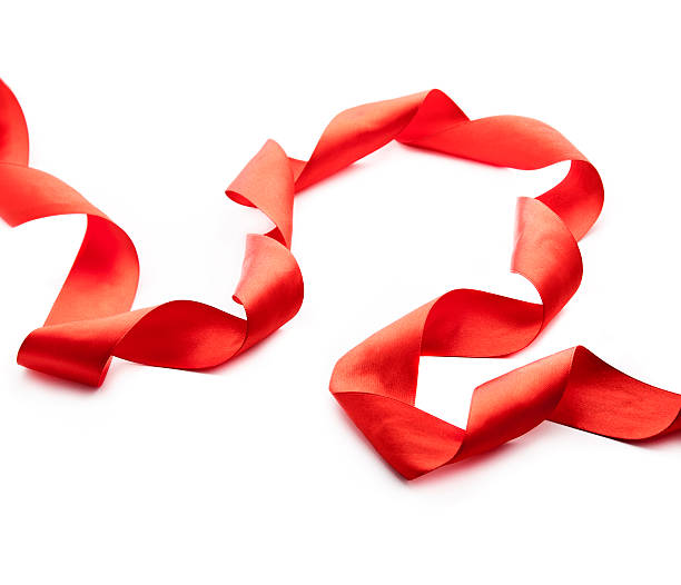 istock Shiny red satin ribbon on white background 153712681
