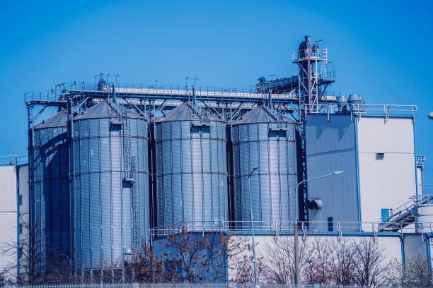 istock Modern silos for storing grain harvest at the blue sky background. 1537135444
