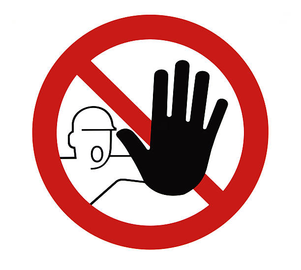 Man's hand outstretched to show that entering is not allowed
