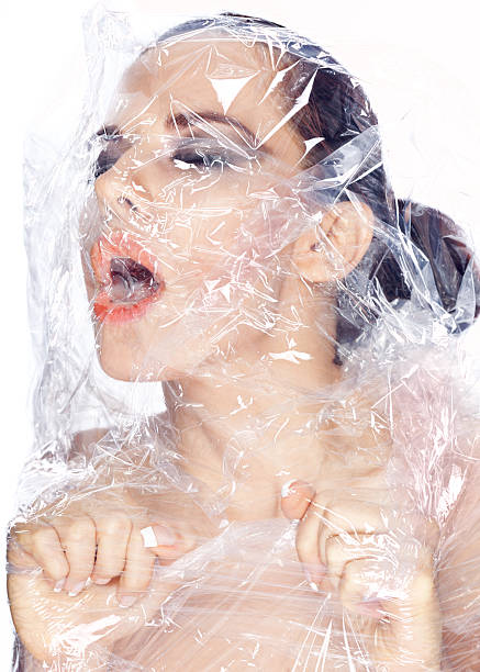 istock Girl suffocates in a plastic bag 153715038